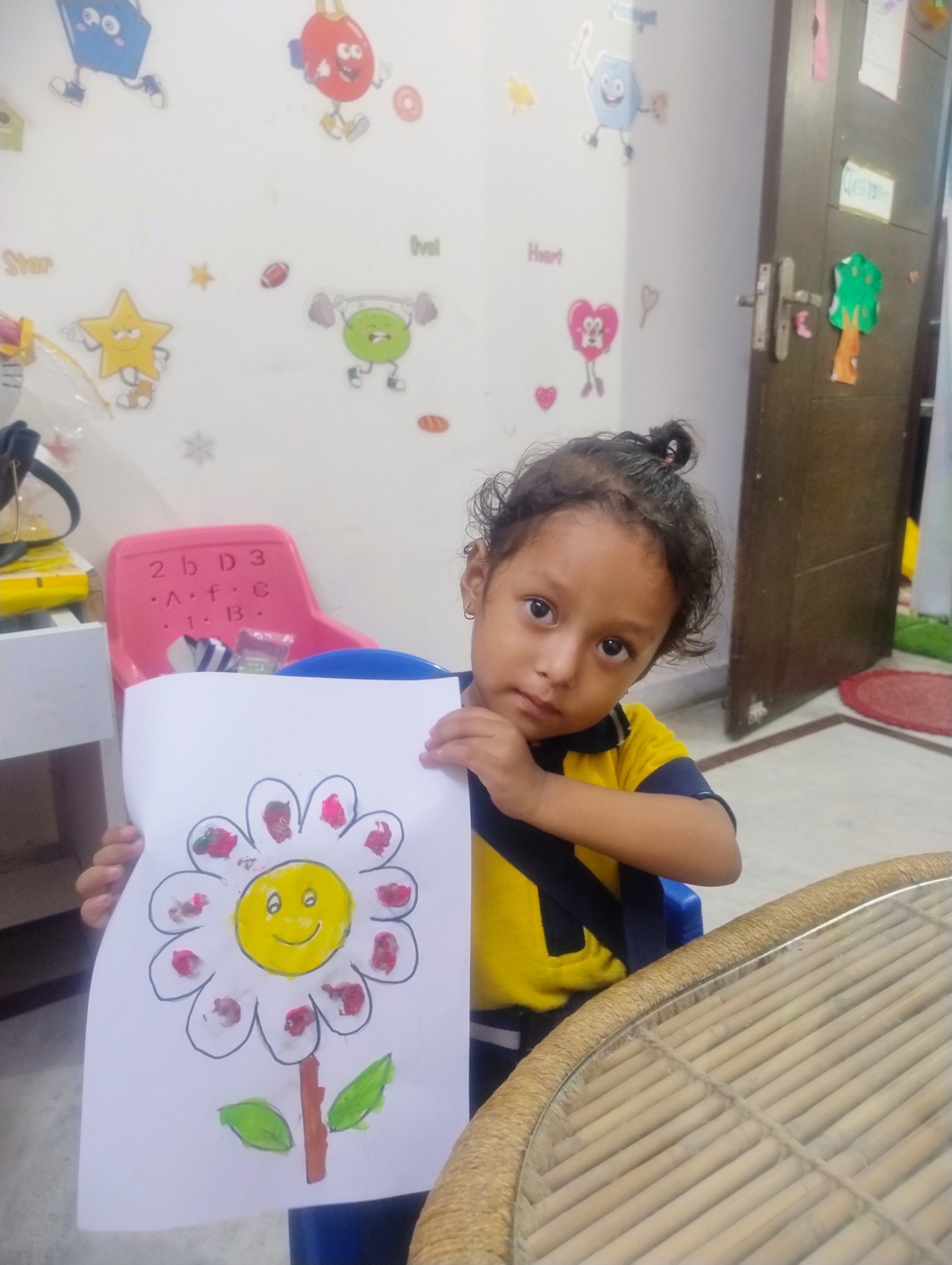 Three children engaged in a learning activity